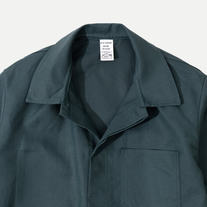 Men's dark green utility jacket with spread collar, button front and patch pockets