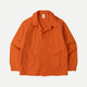 Orange utility jacket with four patch pockets