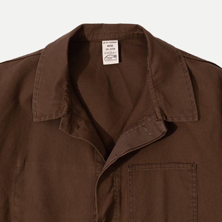 Brown utility jacket with button front and patch pockets