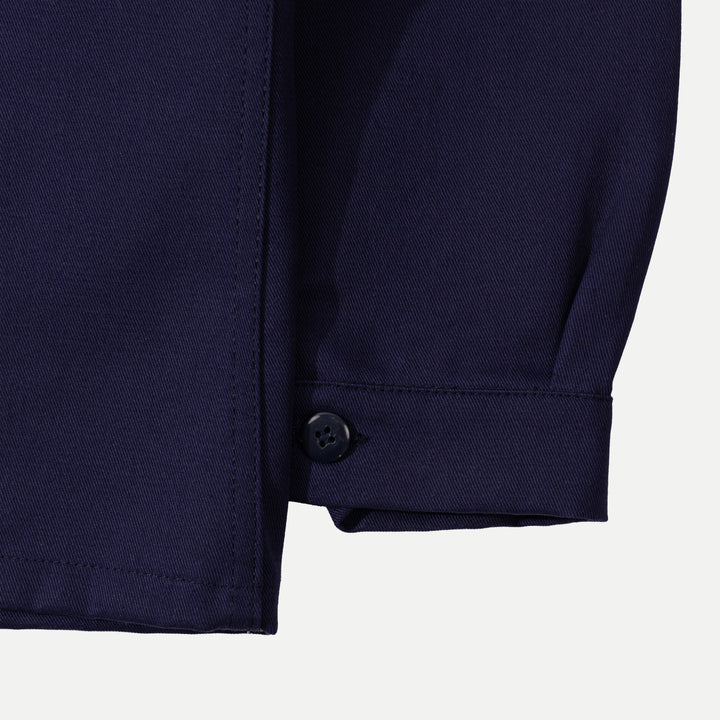 Men's navy utility jacket with point collar, button front and patch pockets