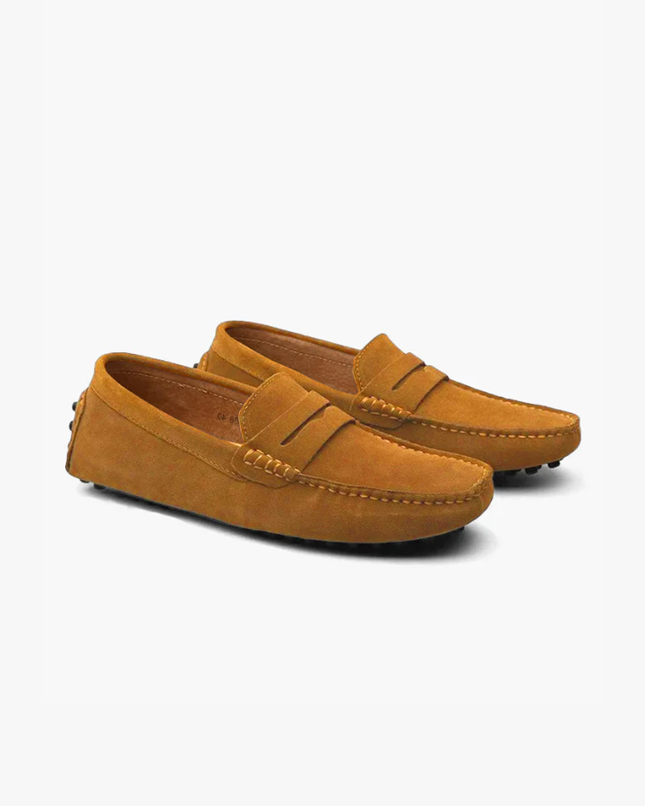 Men's penny loafers with rounded moc toes, vamp straps and stitched detailing