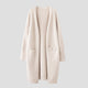 Women's longline open front cardigan with long sleeves and patch pockets