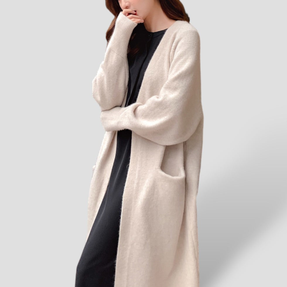 Women's longline open front cardigan with long sleeves and patch pockets