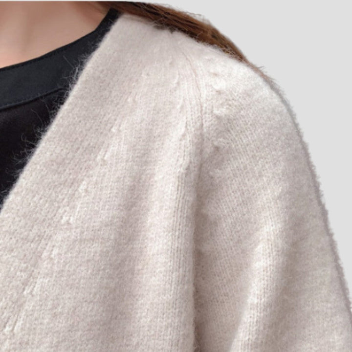Women's longline open front cardigan with long sleeves and patch pockets