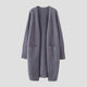 Women's longline open front cardigan with long sleeves and patch pockets