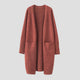 Women's longline open front cardigan with long sleeves and patch pockets