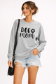 Women's long-sleeve crewneck sweatshirt with Dog Mom graphic print