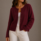 Women's long-sleeve button front cardigan with crew neckline and ribbed trims