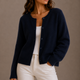 Women's long-sleeve button front cardigan with crew neckline and ribbed trims