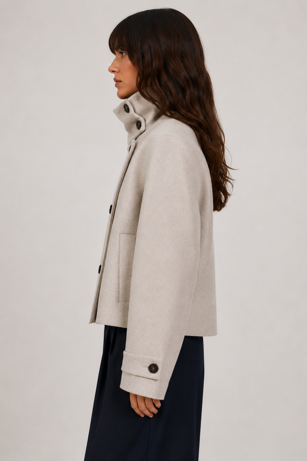 Women's cream short coat with high collar, long sleeves and front buttons