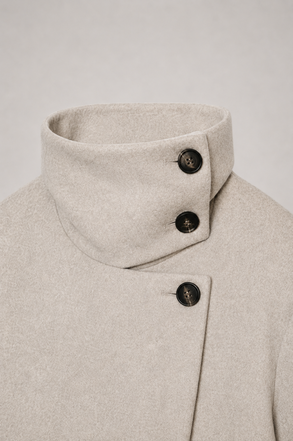 Women's cream short coat with high collar, long sleeves and front buttons