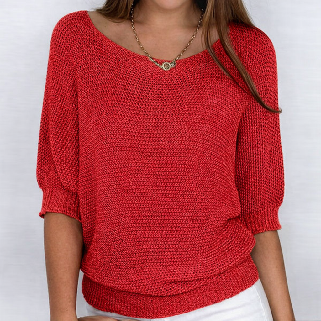 Women's textured knit sweater with round neckline and three-quarter sleeves