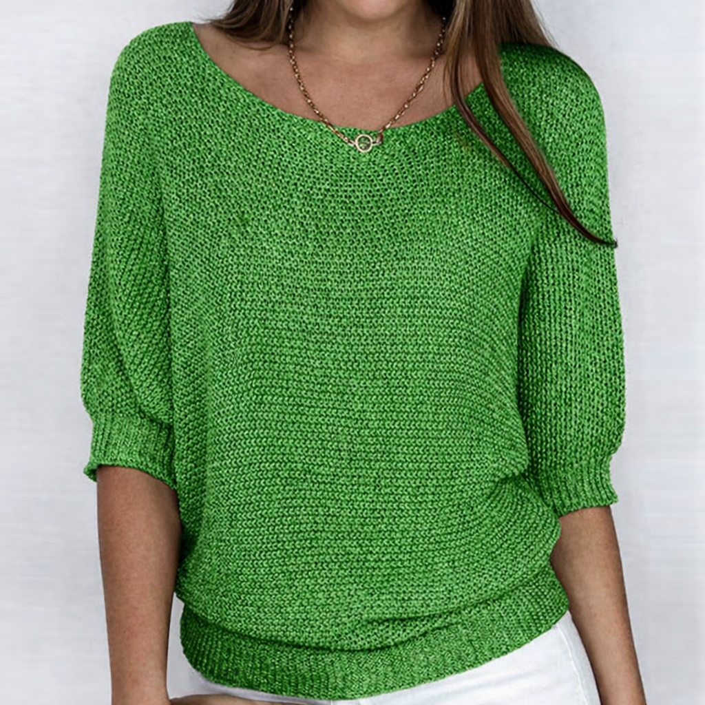 Women's textured knit sweater with round neckline and three-quarter sleeves