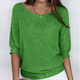 Women's textured knit sweater with round neckline and three-quarter sleeves