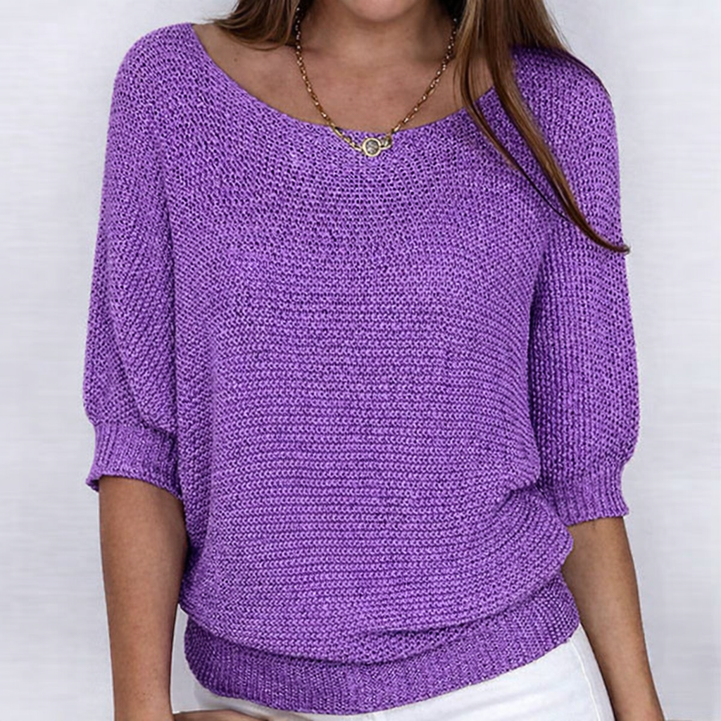 Women's textured knit sweater with round neckline and three-quarter sleeves