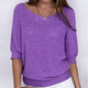 Women's textured knit sweater with round neckline and three-quarter sleeves