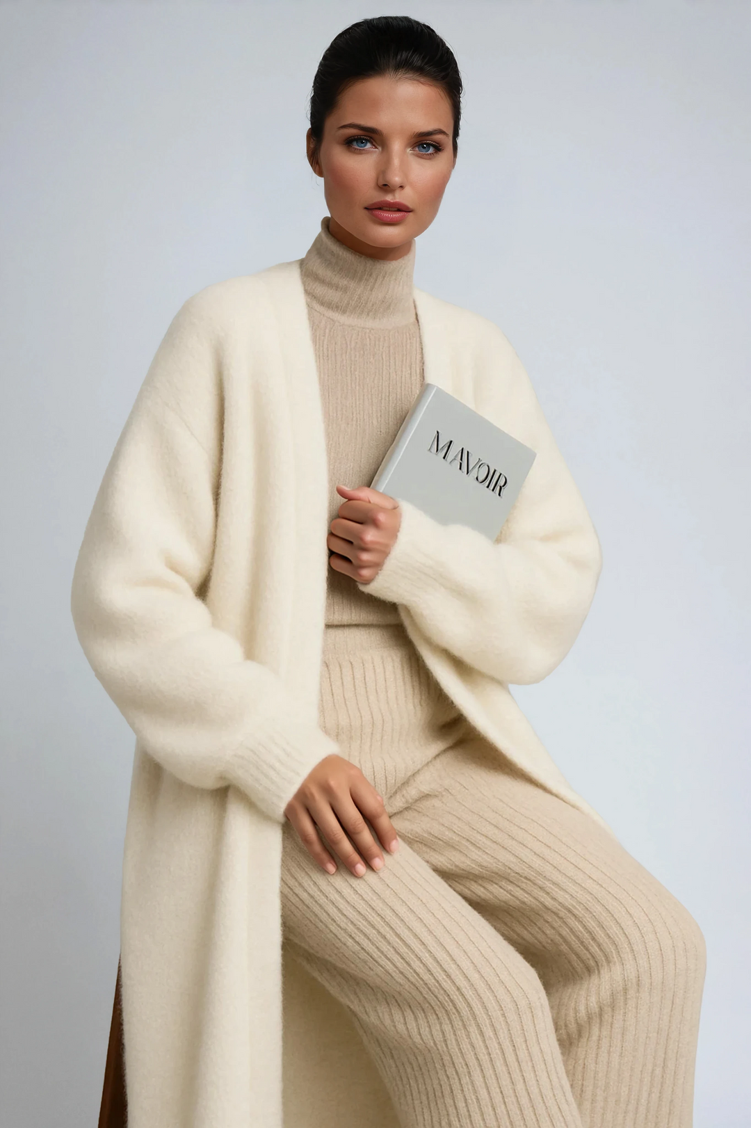 Women's long open front knit coat with relaxed fit and long sleeves