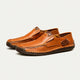 Men's slip-on moc toe loafers with stitched detailing and flat soles