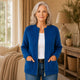 Women's ribbed knit zip-front cardigan with crew neck and patch pockets