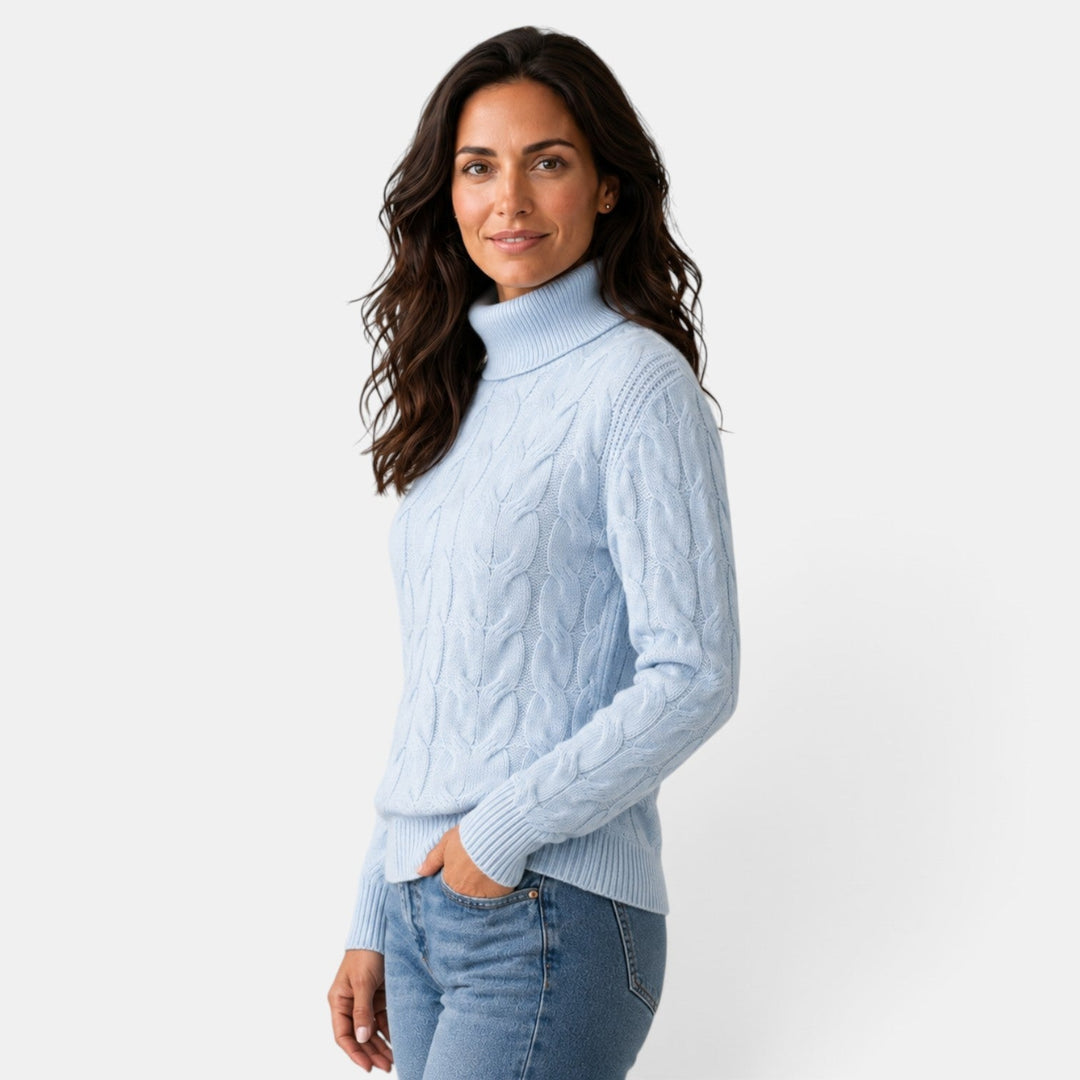 Women's long-sleeve cable knit turtleneck sweater with ribbed trims