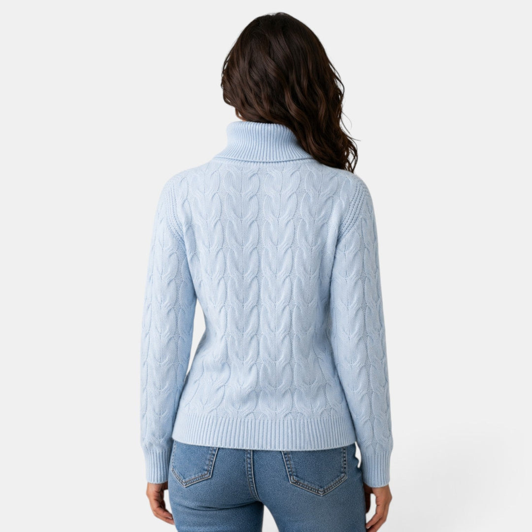 Women's long-sleeve cable knit turtleneck sweater with ribbed trims