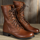 Men's brown lace-up boots with round toes, metal eyelets and low heels