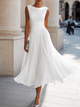 Women's sleeveless boat neck midi dress with pleated skirt in white and black
