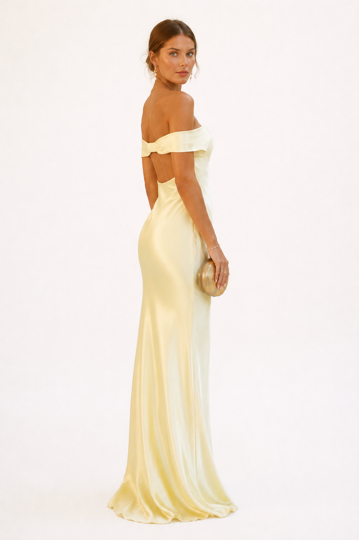 Women's yellow off-shoulder maxi dress with sweetheart neckline and draped sleeves