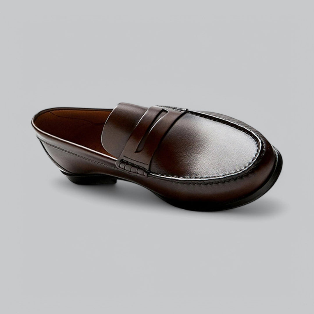 Leather loafers with penny strap detail shown in brown and black
