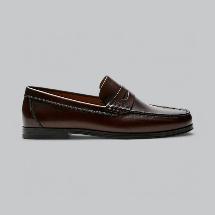 Leather loafers with penny strap detail shown in brown and black