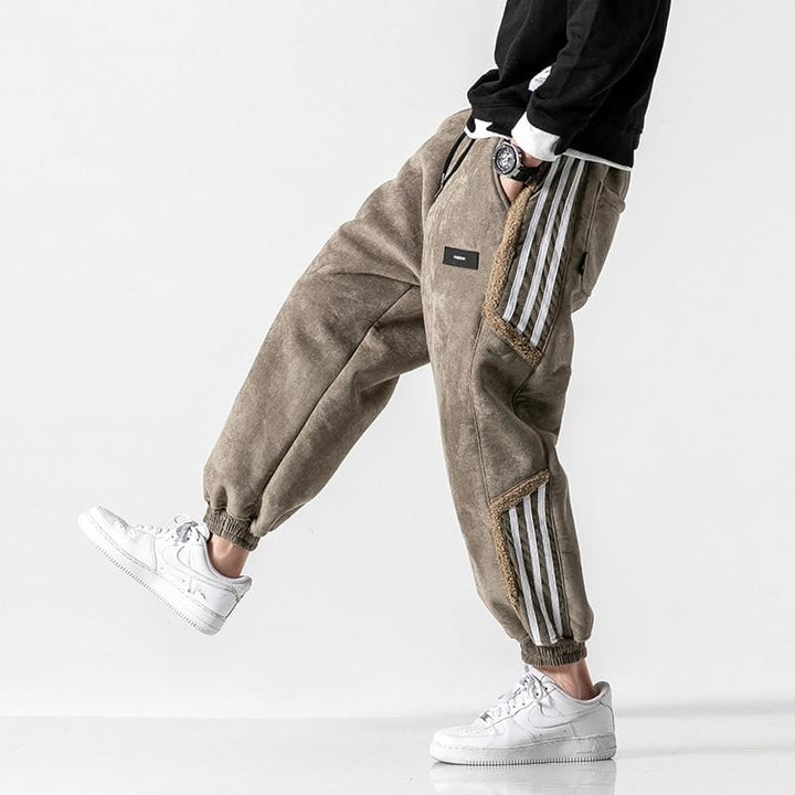 Fleece jogger pants with striped side panels and elasticated cuffs