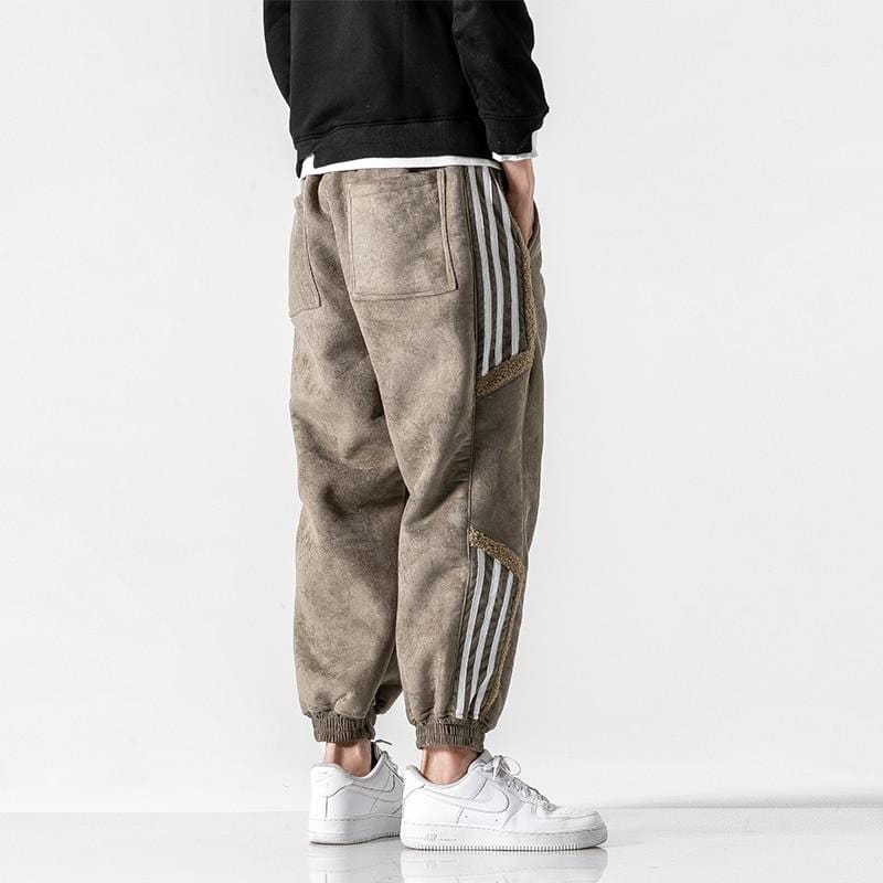 Fleece jogger pants with striped side panels and elasticated cuffs