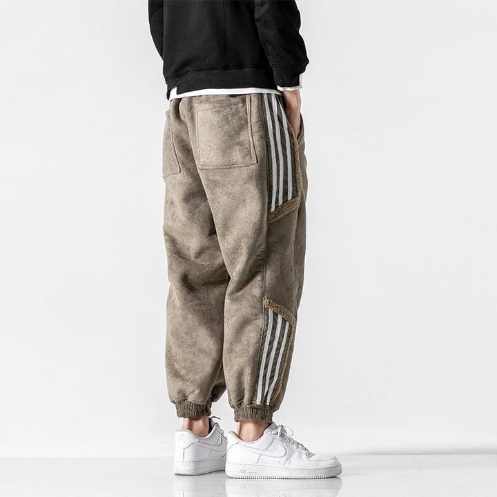 Fleece jogger pants with striped side panels and elasticated cuffs