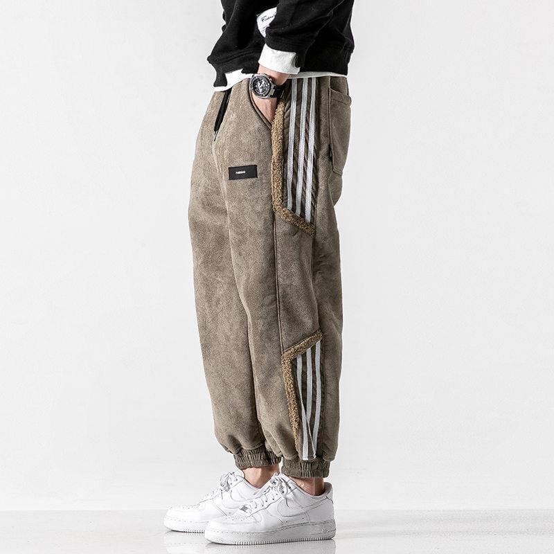 Fleece jogger pants with striped side panels and elasticated cuffs