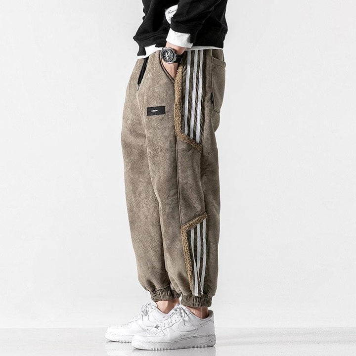 Fleece jogger pants with striped side panels and elasticated cuffs