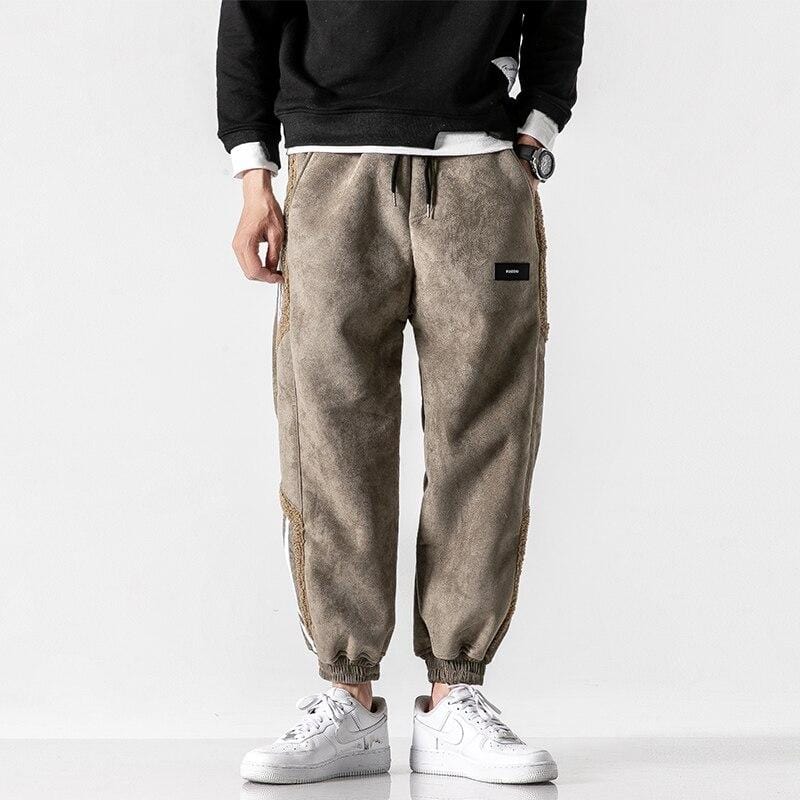Fleece jogger pants with striped side panels and elasticated cuffs