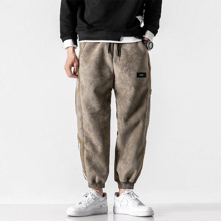 Fleece jogger pants with striped side panels and elasticated cuffs