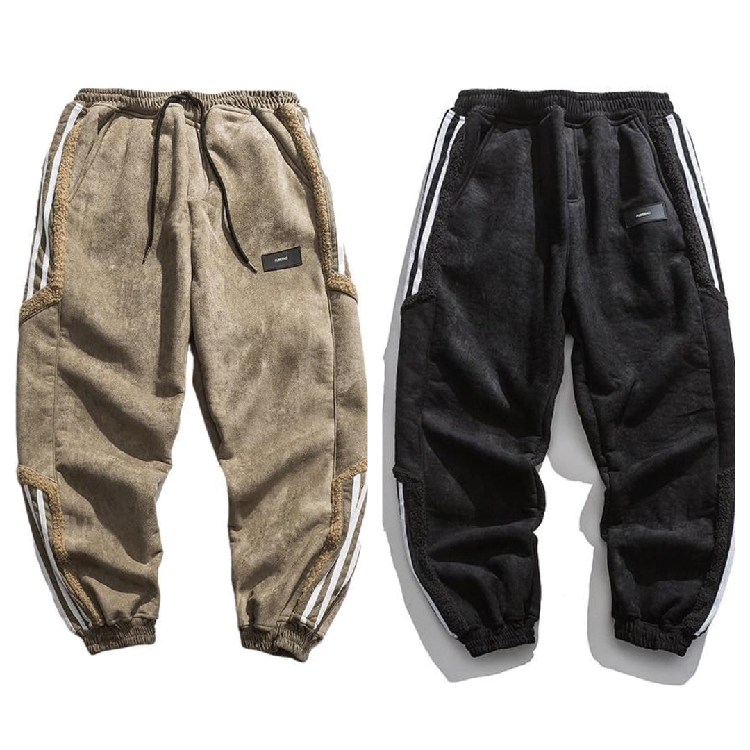 Fleece jogger pants with striped side panels and elasticated cuffs