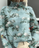Women's long-sleeve roll neck jumper with an all-over floral and botanical graphic