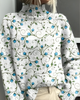 Women's long-sleeve roll neck jumper with an all-over floral and botanical graphic