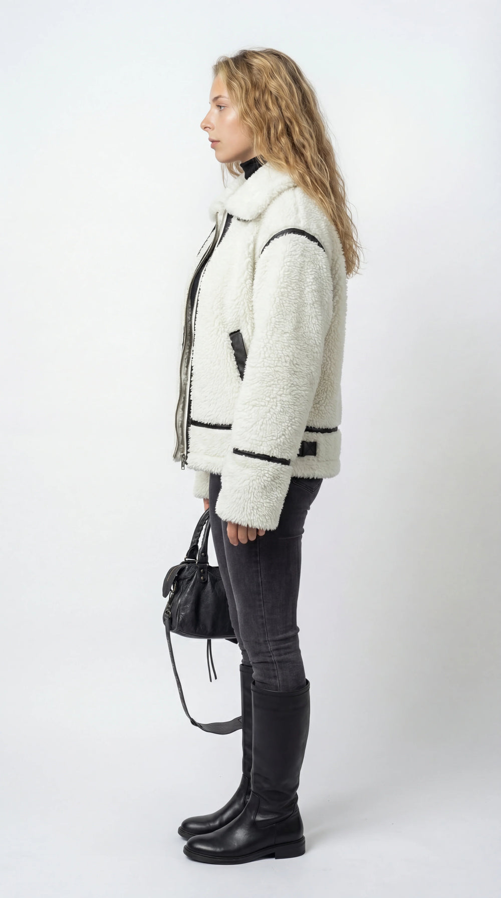 Women's white textured jacket with black trim and front zipper