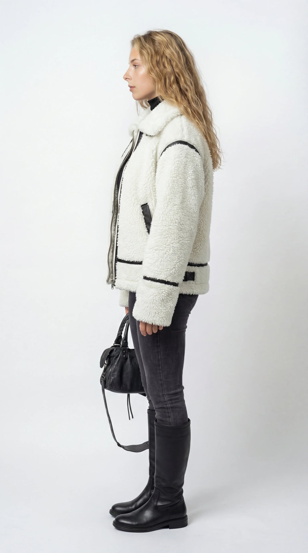Women's white textured jacket with black trim and front zipper