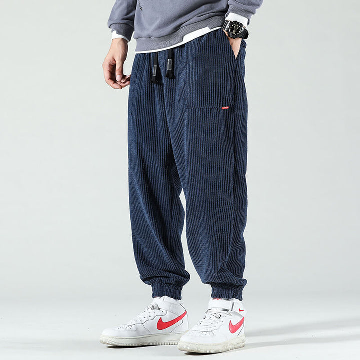 Men's corduroy jogger trousers with drawstring waist and elasticated cuffs