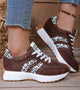 Women's low-top lace-up sneakers with contrast side stripes and raised sole