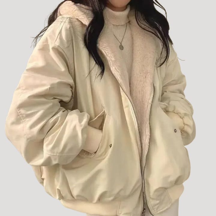Women's padded high-collar winter jacket with zip front and flap pockets