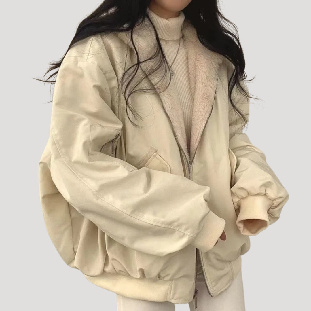 Women's padded high-collar winter jacket with zip front and flap pockets