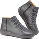 Women's lace-up ankle boots with side zippers, rounded toes and flat soles