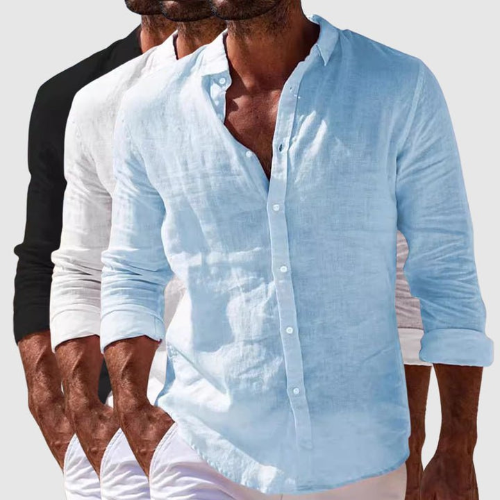 Men's light blue button-front shirt with long sleeves and pointed collar