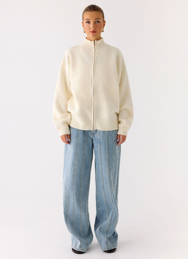 Women's ivory knit zip jacket with mock neck and long sleeves