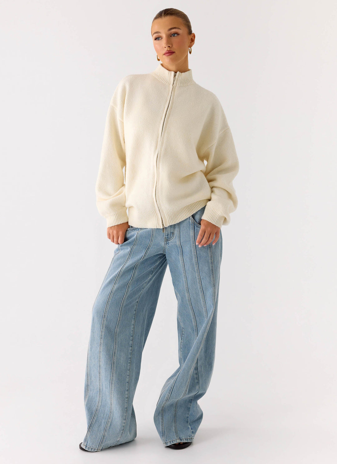 Women's ivory knit zip jacket with mock neck and long sleeves